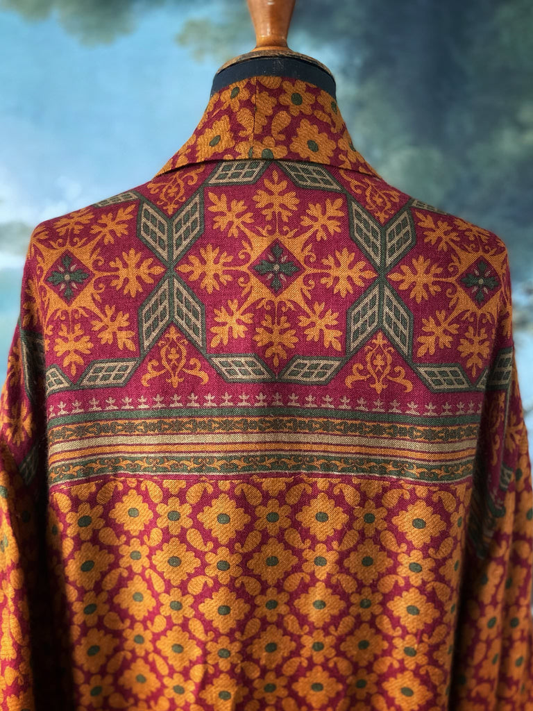 Vibrant saffron and carnelian red fine wool and silk robe with wide sleeves, patch pockets and tassel sash. Bohemian style created from antique and vintage textiles by the Pavilion Parade Studio
