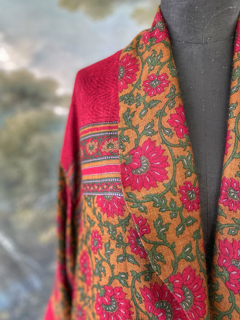 Vibrant ruby red, emerald green, and saffron fine wool robe with block printed paisley boteh pure silk lining. Wide sleeves, deep pockets and tassel sash belt. Bohemian style created from vintage and antique textiles by the Pavilion Parade studio