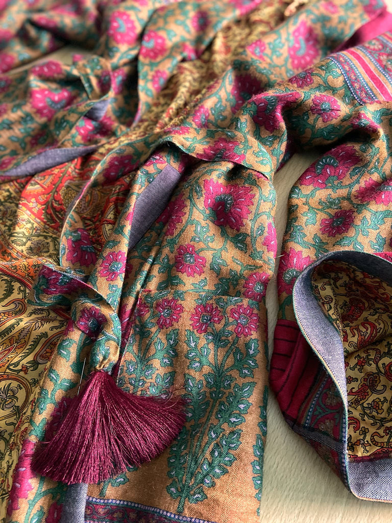 Vibrant ruby red, emerald green, and saffron fine wool robe with block printed paisley boteh pure silk lining. Wide sleeves, deep pockets and tassel sash belt. Bohemian style created from vintage and antique textiles by the Pavilion Parade studio