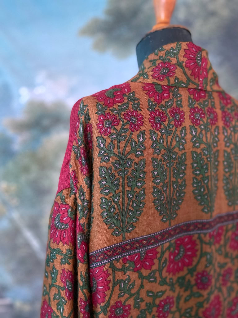 Vibrant ruby red, emerald green, and saffron fine wool robe with block printed paisley boteh pure silk lining. Wide sleeves, deep pockets and tassel sash belt. Bohemian style created from vintage and antique textiles by the Pavilion Parade studio