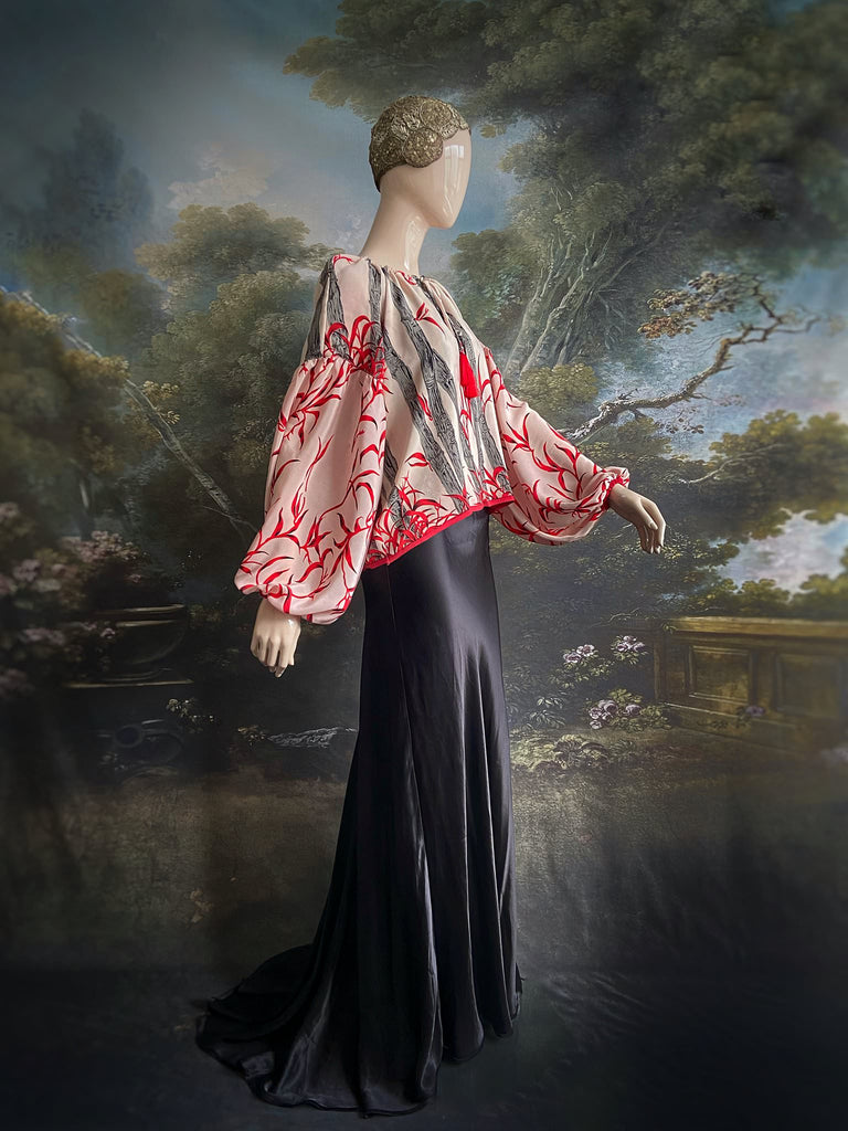 Scarlet, ivory and charcoal grey silk crepe blouse in a 1930s inspired bamboo print, with long full sleeves and adjustable drawstring neckline. Bohemian styles sustainably created from antique and vintage textiles by the Pavilion Parade studio. 