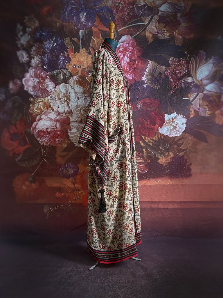 Full length 1920s inspired kimono robe with large patch pockets. Newly created from a red, black and stone vintage silk crepe. Fully lined in silk with French seams throughout. Bohemian styles sustainably created from antique and vintage textiles by the Pavilion Parade studio.