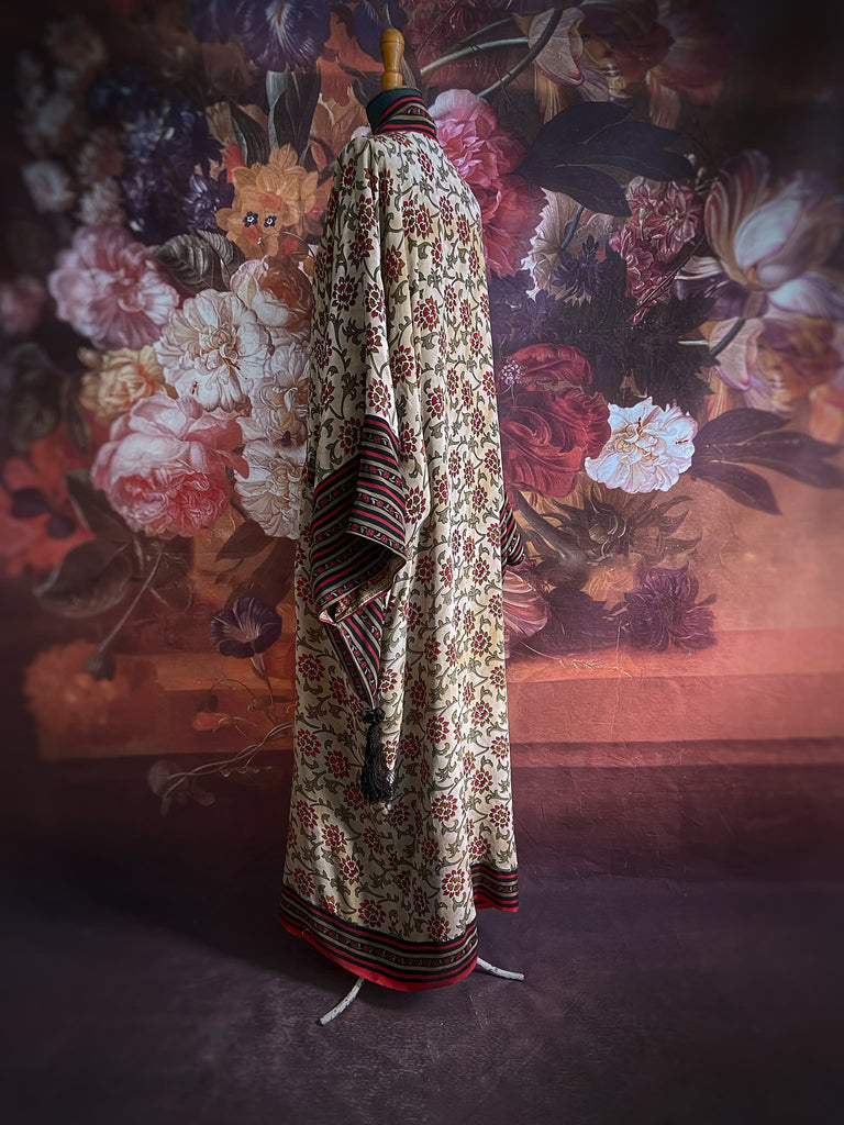 Full length 1920s inspired kimono robe with large patch pockets. Newly created from a red, black and stone vintage silk crepe. Fully lined in silk with French seams throughout. Bohemian styles sustainably created from antique and vintage textiles by the Pavilion Parade studio.