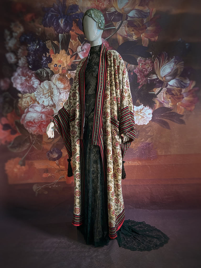 Full length 1920s inspired kimono robe with large patch pockets. Newly created from a red, black and stone vintage silk crepe. Fully lined in silk with French seams throughout. Bohemian styles sustainably created from antique and vintage textiles by the Pavilion Parade studio.