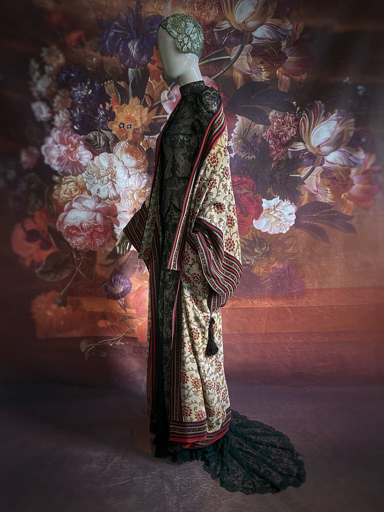 Full length 1920s inspired kimono robe with large patch pockets. Newly created from a red, black and stone vintage silk crepe. Fully lined in silk with French seams throughout. Bohemian styles sustainably created from antique and vintage textiles by the Pavilion Parade studio.