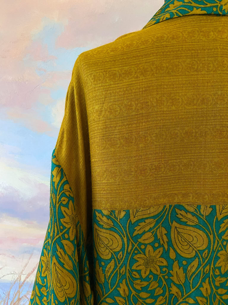 Teal and turmeric yellow silk-lined fine wool dressing robe or duster coat with wide sleeves, pockets and tassel tie sash. Bohemian styles created from antique and vintage textiles by the Pavilion Parade studio.