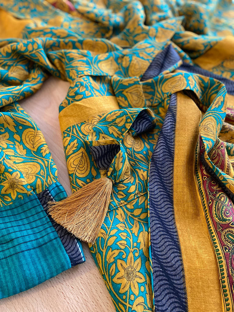 Teal and turmeric yellow silk-lined fine wool dressing robe or duster coat with wide sleeves, pockets and tassel tie sash. Bohemian styles created from antique and vintage textiles by the Pavilion Parade studio.