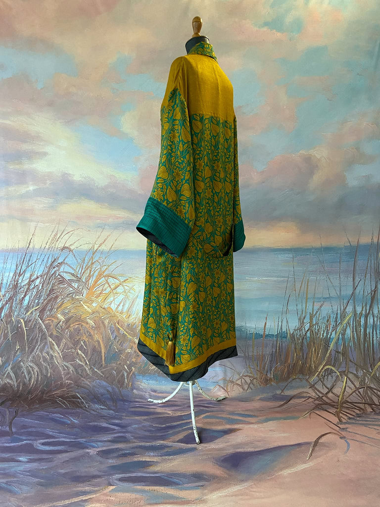 Teal and turmeric yellow silk-lined fine wool dressing robe or duster coat with wide sleeves, pockets and tassel tie sash. Bohemian styles created from antique and vintage textiles by the Pavilion Parade studio.