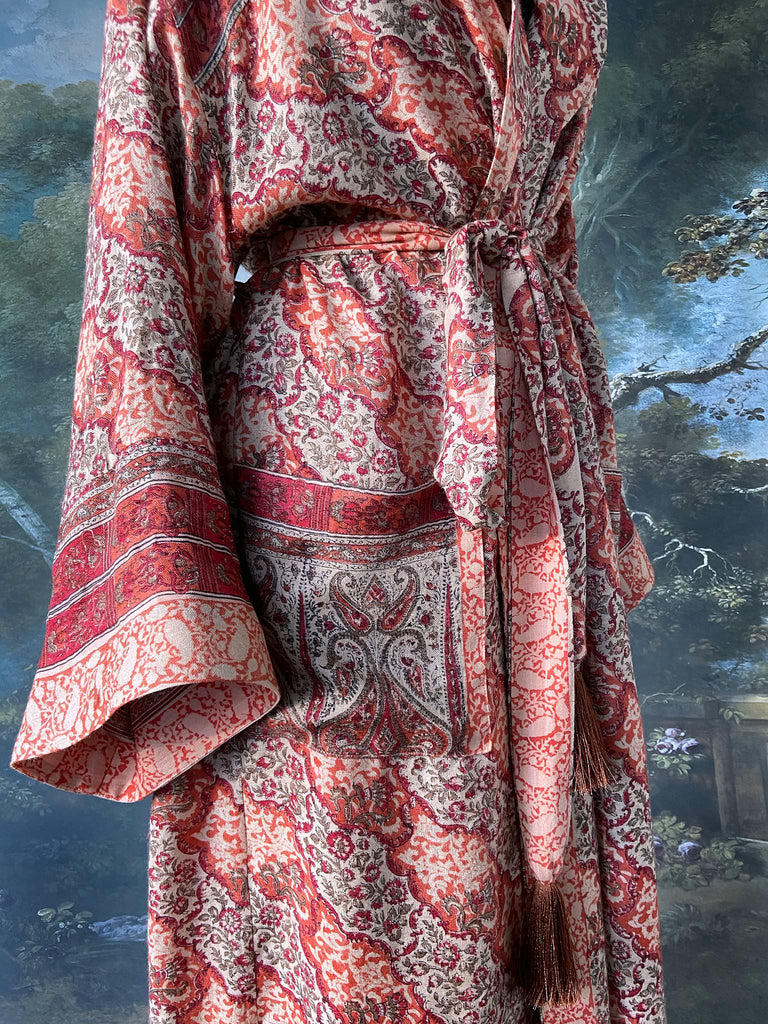 Terracotta and stone fine wool dressing robe with wide sleeves, deep pockets and tassel sash. Bohemian styles sustainably created from antique and vintage textiles by the Pavilion Parade studio