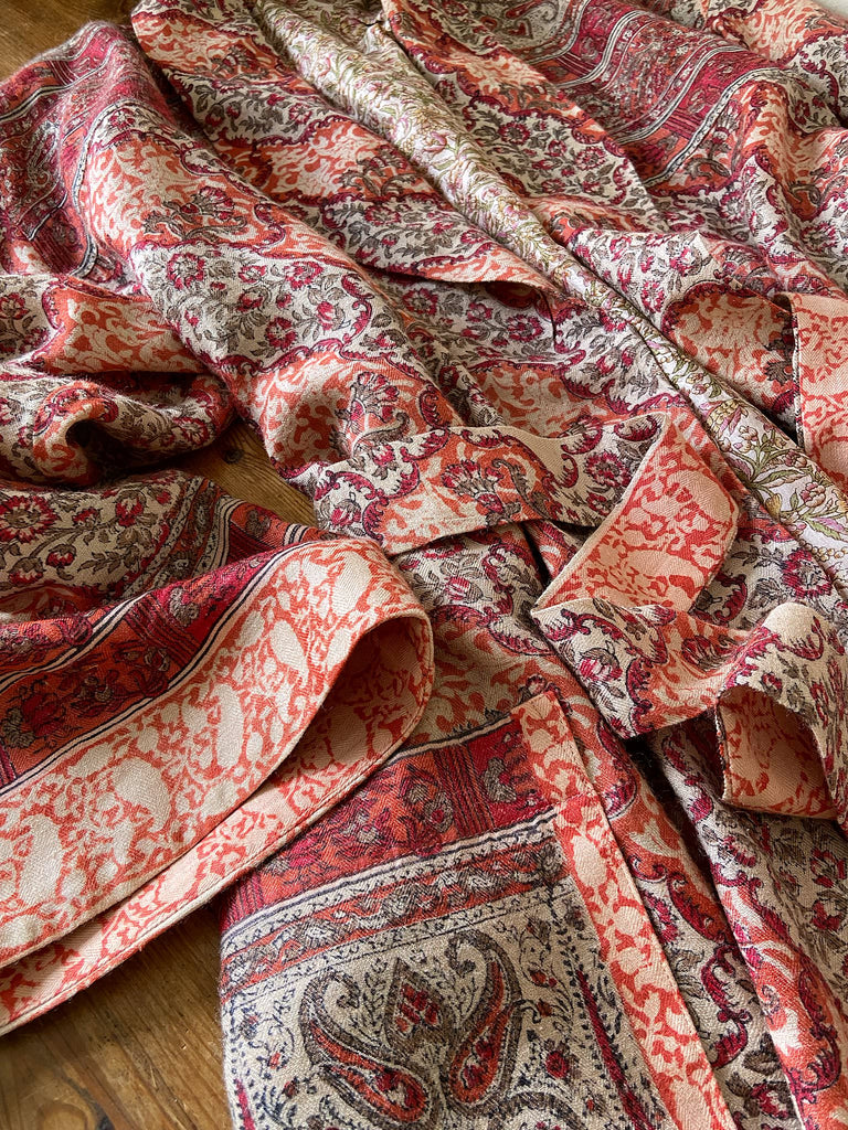 Terracotta and stone fine wool dressing robe with wide sleeves, deep pockets and tassel sash. Bohemian styles sustainably created from antique and vintage textiles by the Pavilion Parade studio