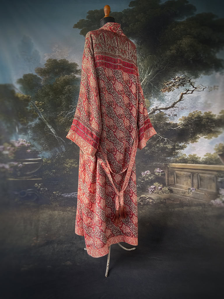 Terracotta and stone fine wool dressing robe with wide sleeves, deep pockets and tassel sash. Bohemian styles sustainably created from antique and vintage textiles by the Pavilion Parade studio