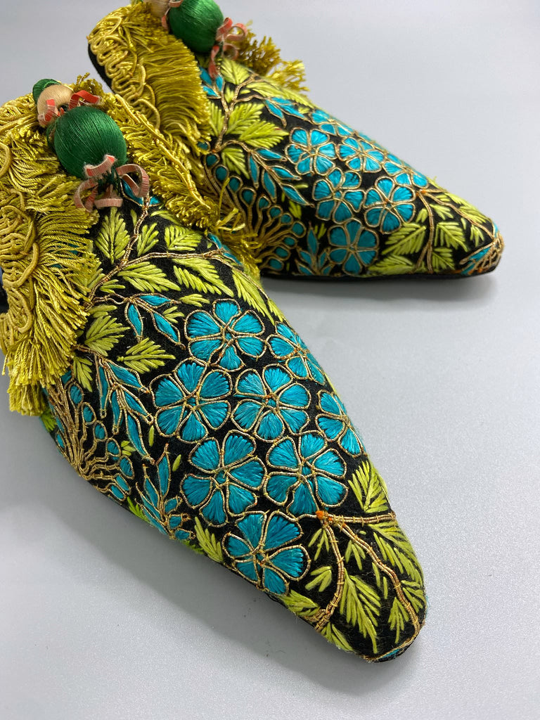 Hand embroidered suzani pointed toe shoes in chartreuse, turquoise and gold. Unique bohemian styles created from antique and vintage textiles by the Pavilion Parade studio.