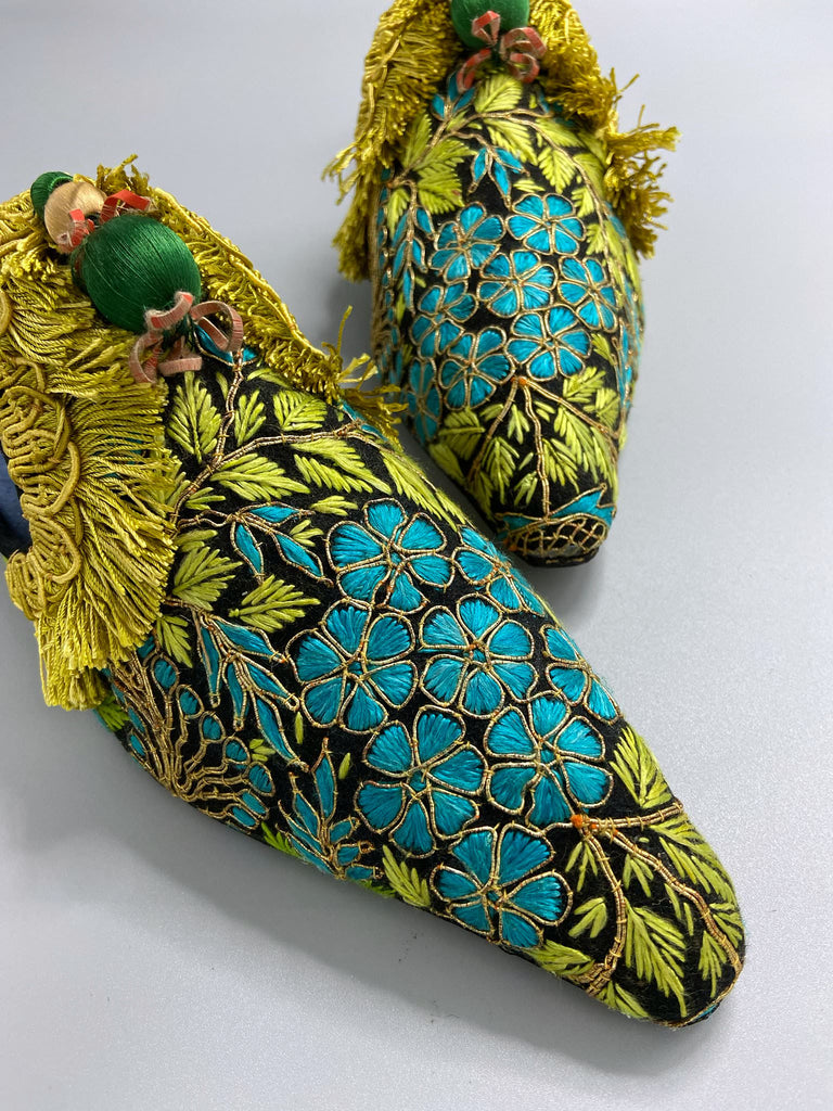 Hand embroidered suzani pointed toe shoes in chartreuse, turquoise and gold. Unique bohemian styles created from antique and vintage textiles by the Pavilion Parade studio.