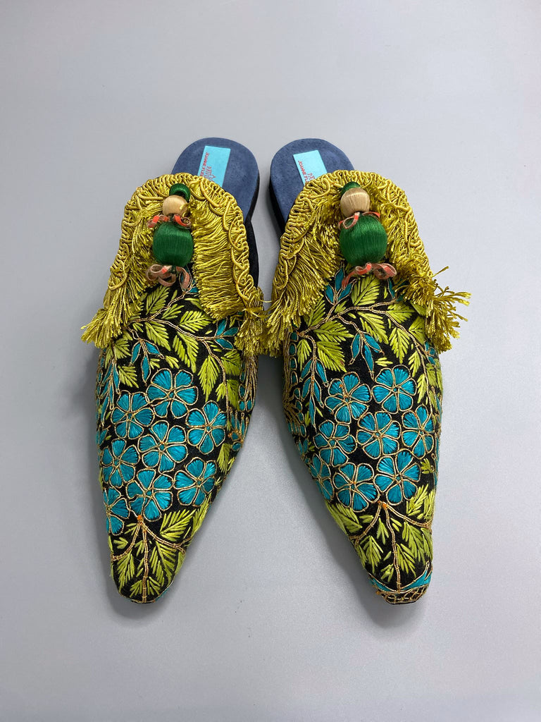 Hand embroidered suzani pointed toe shoes in chartreuse, turquoise and gold. Unique bohemian styles created from antique and vintage textiles by the Pavilion Parade studio.