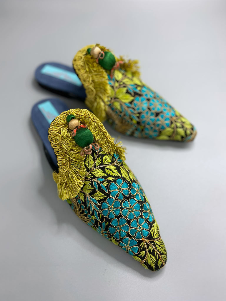 Hand embroidered suzani pointed toe shoes in chartreuse, turquoise and gold. Unique bohemian styles created from antique and vintage textiles by the Pavilion Parade studio.