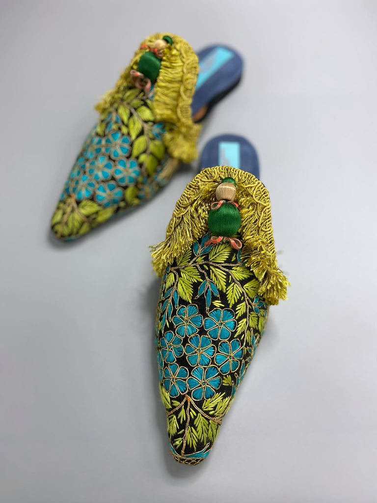 Hand embroidered suzani pointed toe shoes in chartreuse, turquoise and gold. Unique bohemian styles created from antique and vintage textiles by the Pavilion Parade studio.
