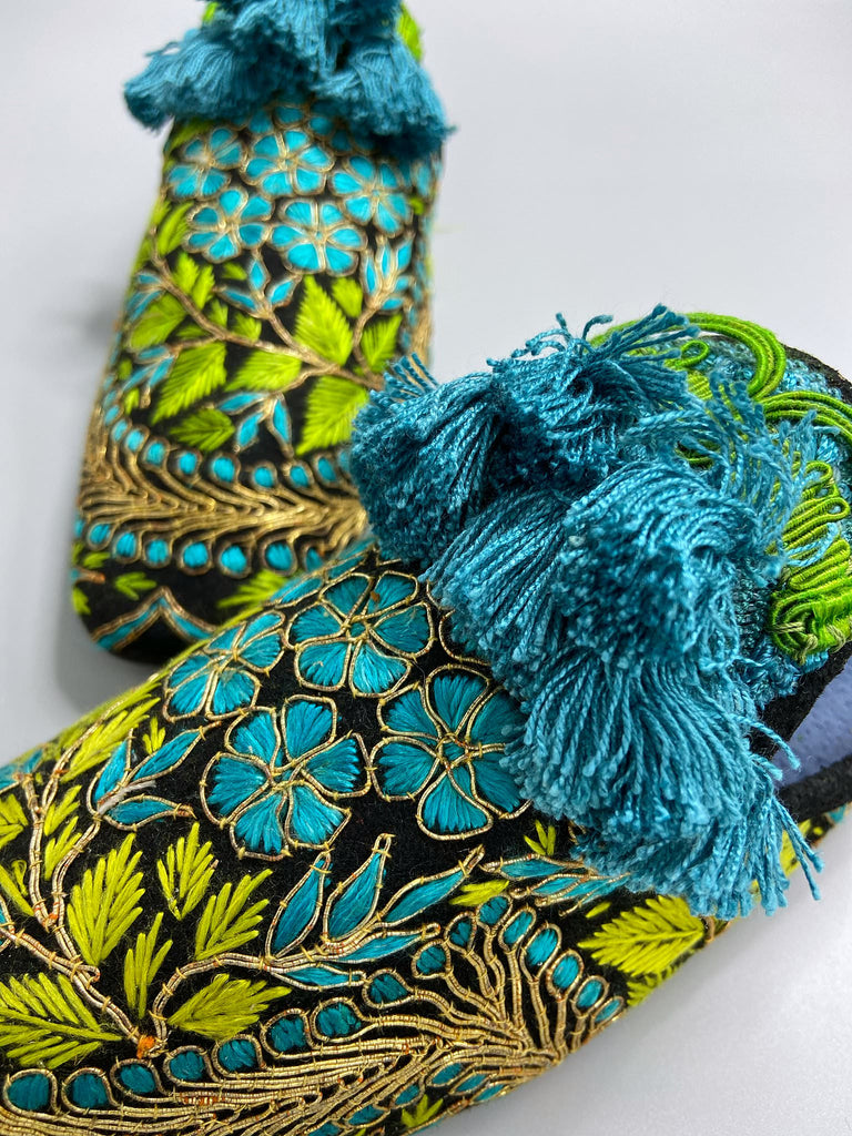 Hand embroidered suzani extended toe shoes in chartreuse, turquoise and gold. Unique bohemian styles created from antique and vintage textiles by the Pavilion Parade studio.