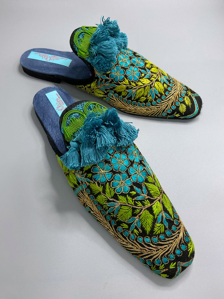 Hand embroidered suzani extended toe shoes in chartreuse, turquoise and gold. Unique bohemian styles created from antique and vintage textiles by the Pavilion Parade studio.