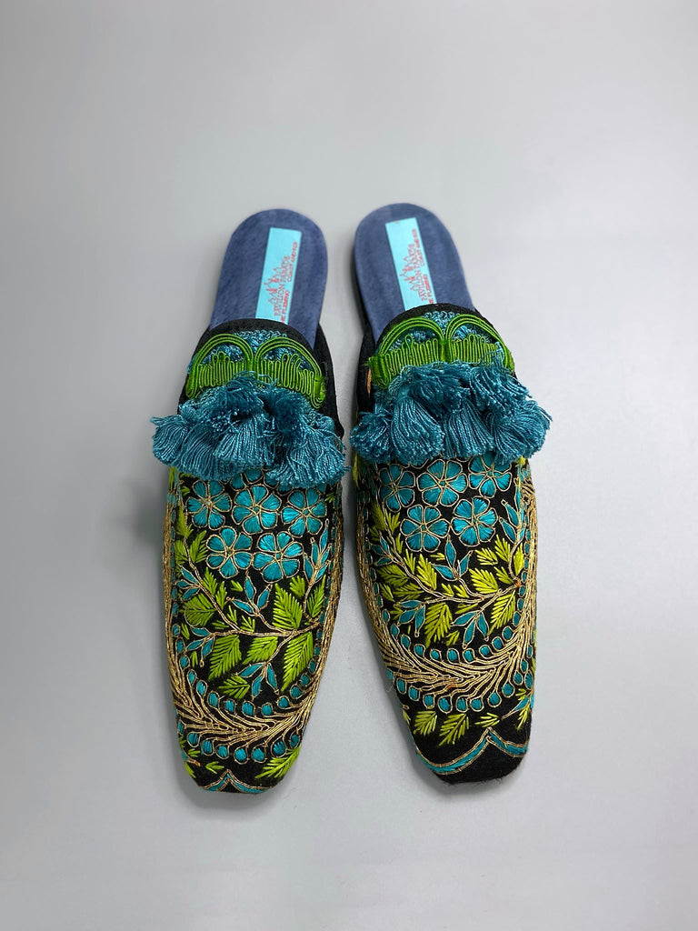 Hand embroidered suzani extended toe shoes in chartreuse, turquoise and gold. Unique bohemian styles created from antique and vintage textiles by the Pavilion Parade studio.