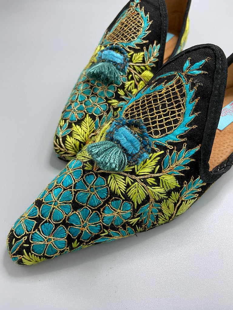 Hand embroidered suzani pointed toe shoes in chartreuse, turquoise and gold. Unique bohemian styles created from antique and vintage textiles by the Pavilion Parade studio.