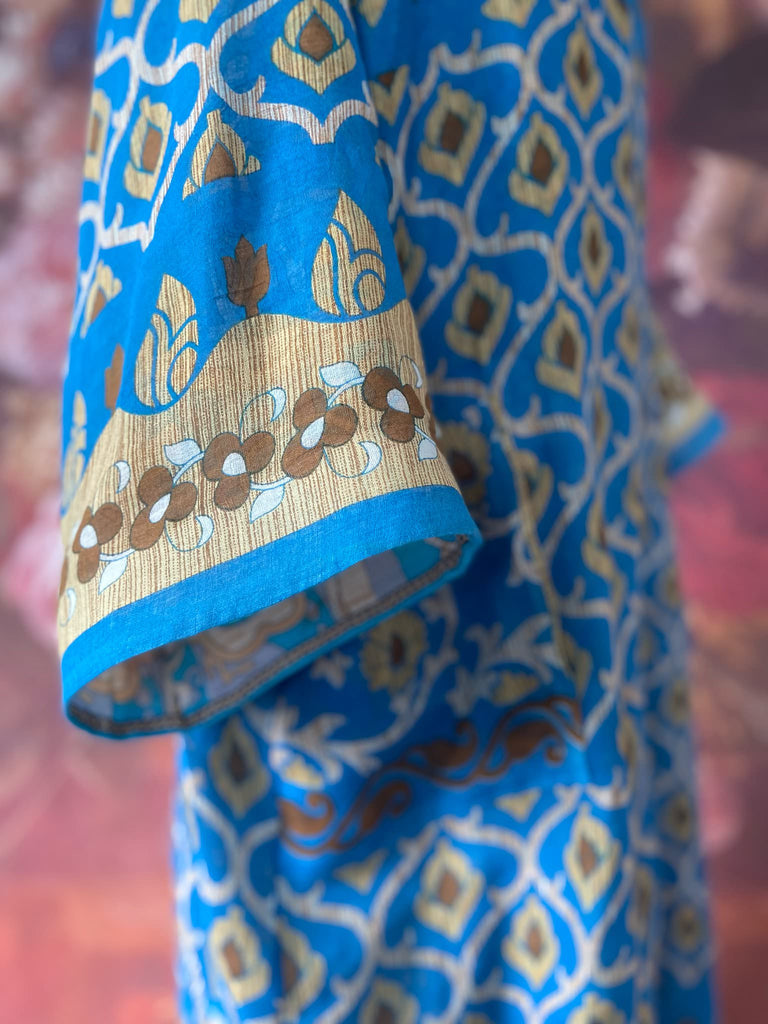 Cerulean blue and turquoise reversible fine cotton kaftan dress. Bohemian style sustainably created from antique and vintage textiles by the Pavilion Parade studio.