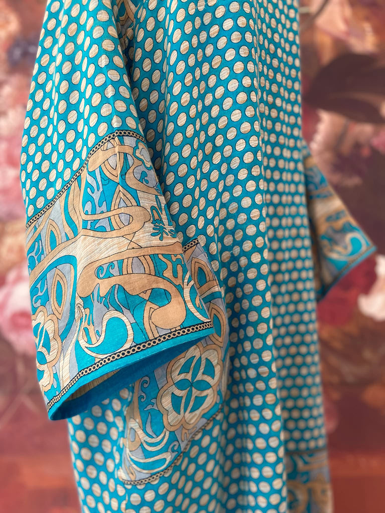 Cerulean blue and turquoise reversible fine cotton kaftan dress. Bohemian style sustainably created from antique and vintage textiles by the Pavilion Parade studio.