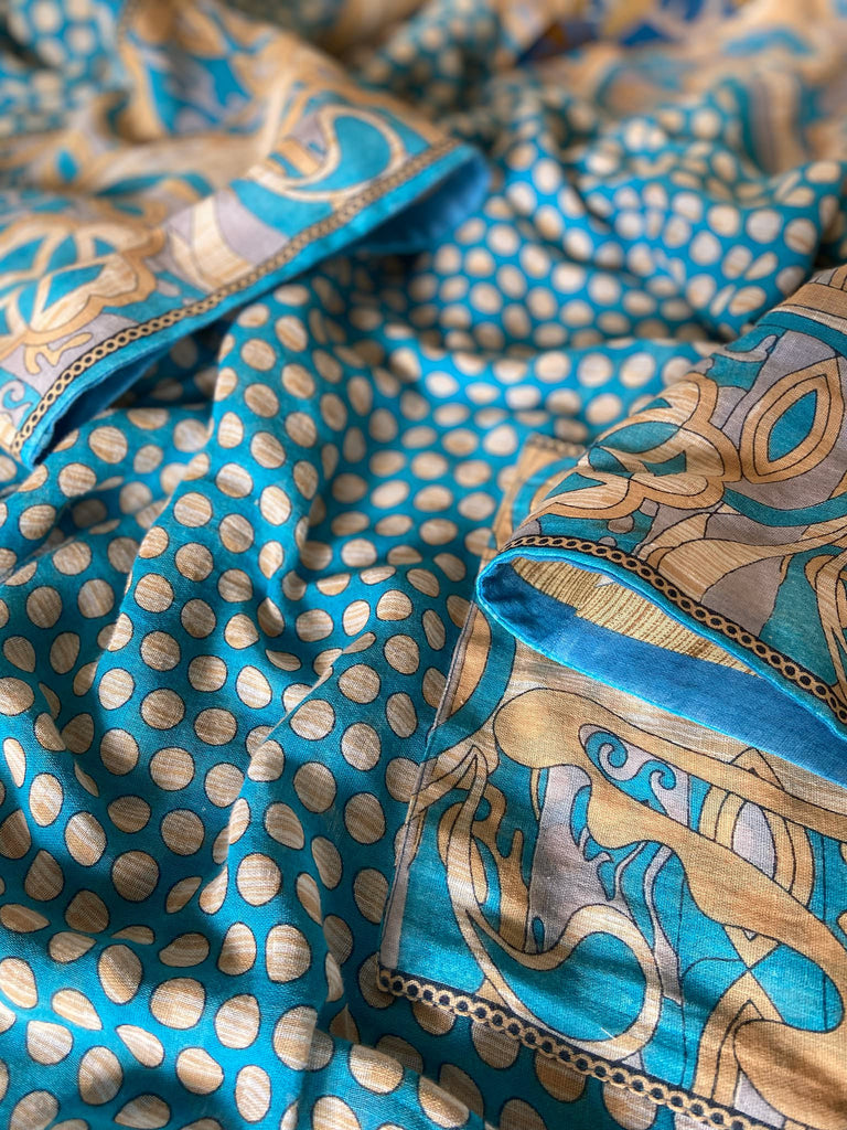 Cerulean blue and turquoise reversible fine cotton kaftan dress. Bohemian style sustainably created from antique and vintage textiles by the Pavilion Parade studio.