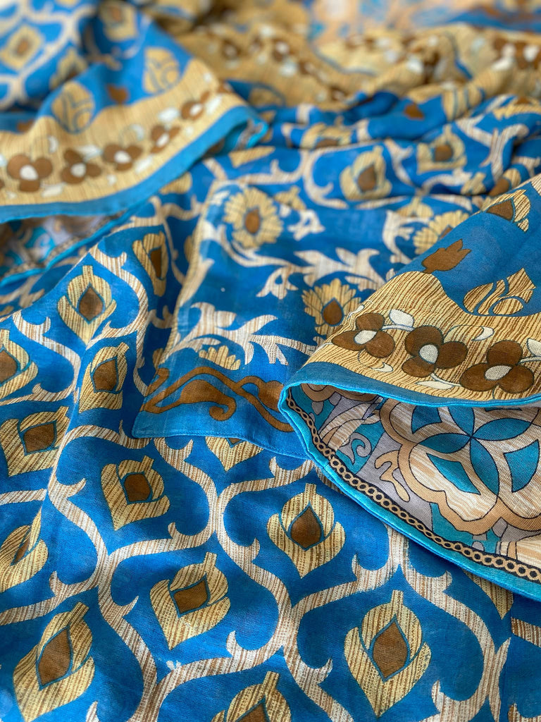 Cerulean blue and turquoise reversible fine cotton kaftan dress. Bohemian style sustainably created from antique and vintage textiles by the Pavilion Parade studio.