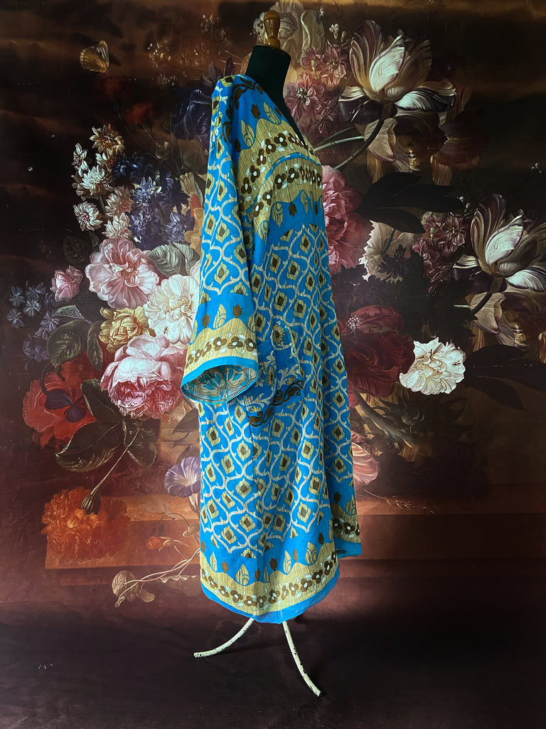 Cerulean blue and turquoise reversible fine cotton kaftan dress. Bohemian style sustainably created from antique and vintage textiles by the Pavilion Parade studio.