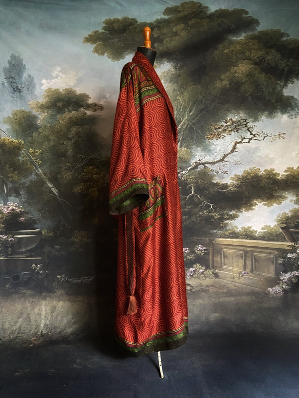 Rust red and green fine wool robe with colourful silk lining. Sustainaly created from vintage and antique textiles by the Pavilion Parade studio
