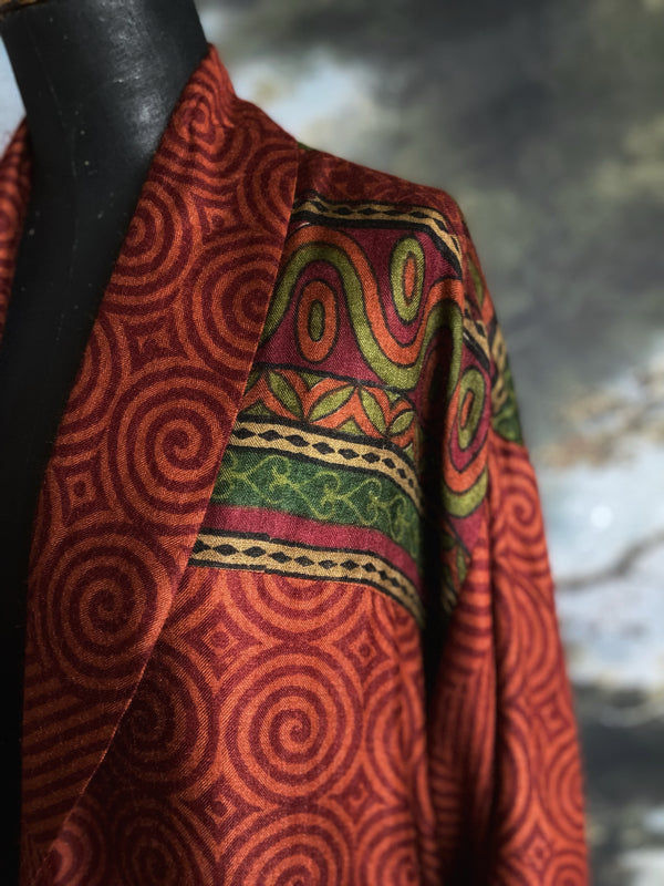 Rust red and green fine wool robe with colourful silk lining. Sustainaly created from vintage and antique textiles by the Pavilion Parade studio