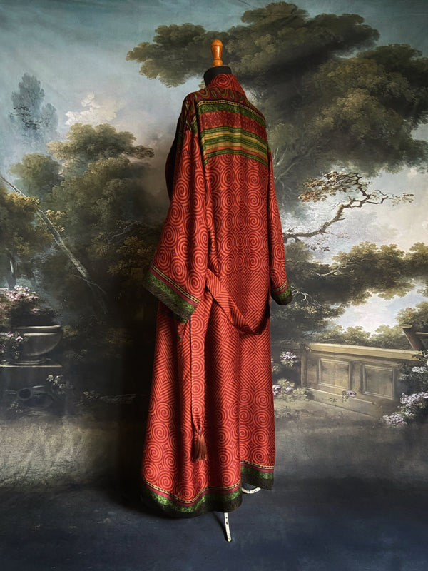 Rust red and green fine wool robe with colourful silk lining. Sustainaly created from vintage and antique textiles by the Pavilion Parade studio