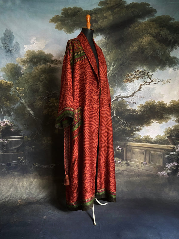 Rust red and green fine wool robe with colourful silk lining. Sustainaly created from vintage and antique textiles by the Pavilion Parade studio