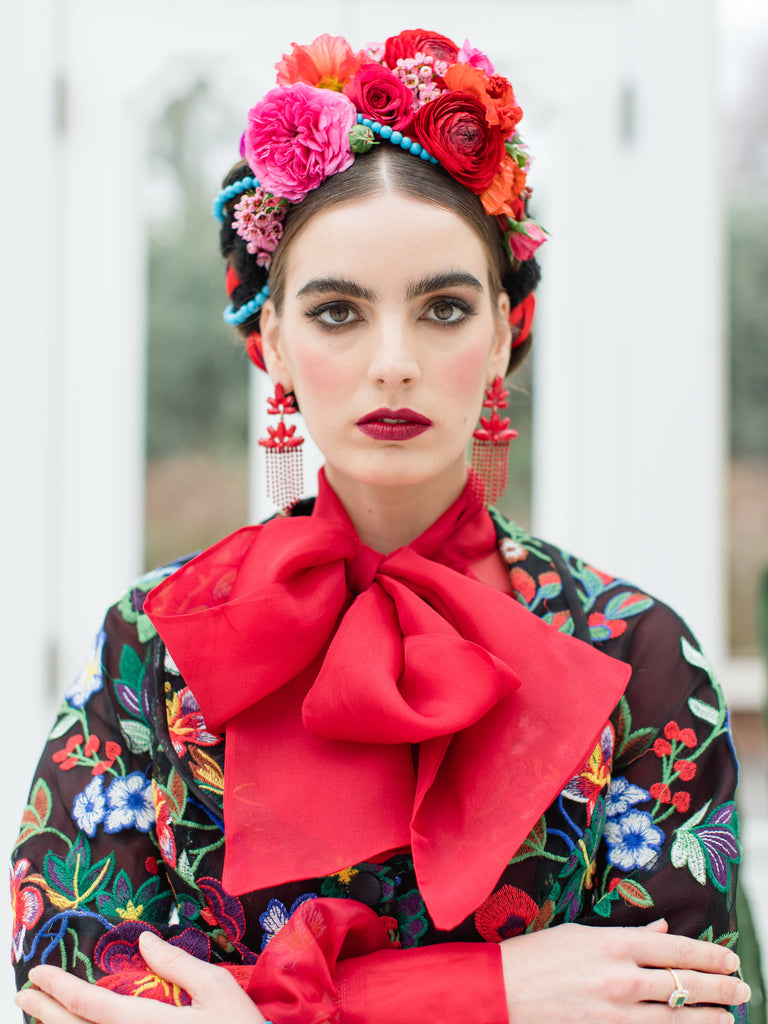Frida Kahlo inspired embroidered silk and tulle bodice jacket with picture neckline and pagoda sleeves. Vivid black, red, green and blue floral. Flight of fancy from the Pavilion Parade studio. 