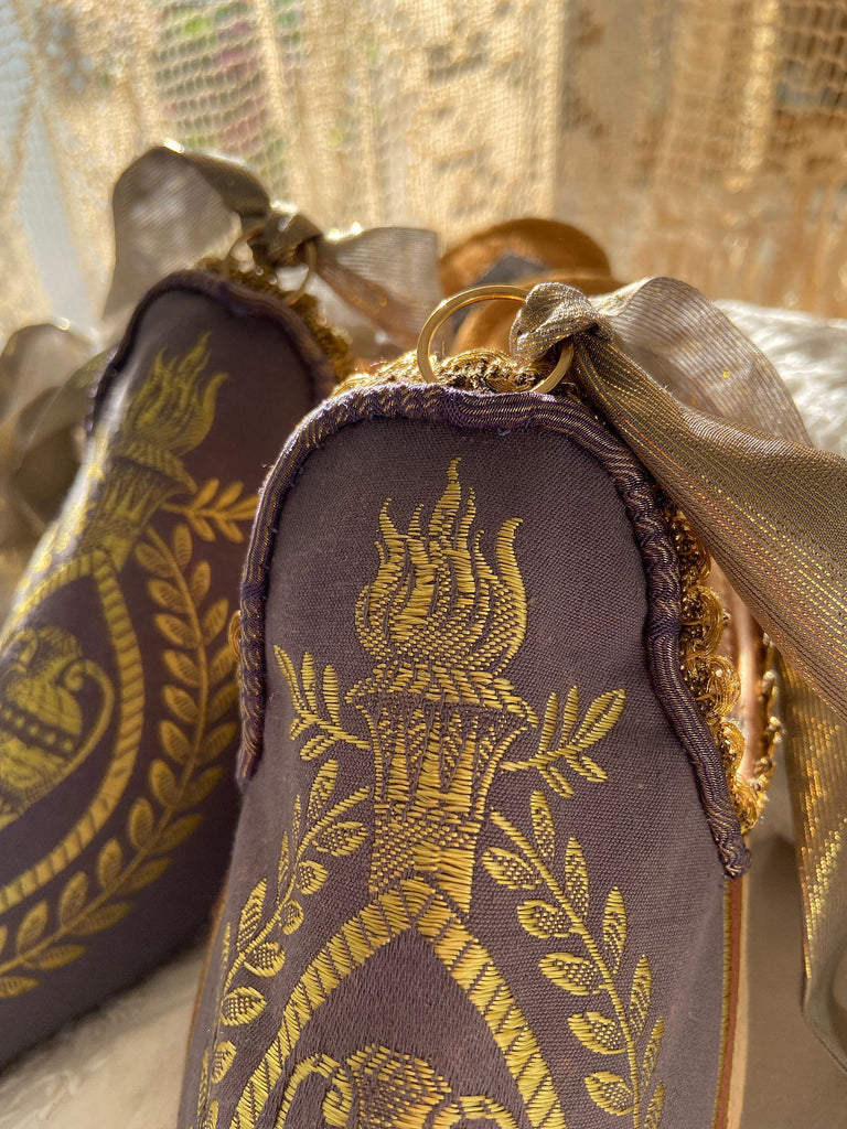 Pavilion Parade handmade shoes created from antique textiles,  available from Joanne Fleming Design. Antique neo-classical brocade and 19th century passementerie create bohemian flat shoes in shades of lavender and gold.