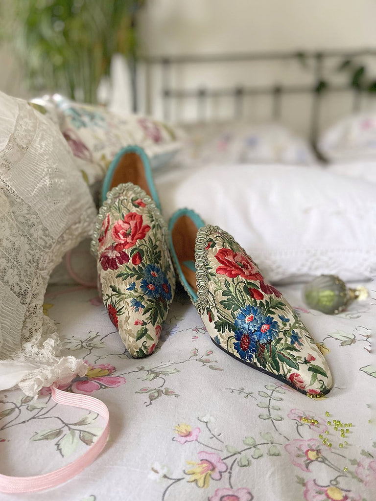 Vita embroidered floral silk brocade bohemian shoes created from antique textiles by PavilionParade. Cottage garden flowers poppies and cornflowers in reds pinks and blues on a pale sage bone ground. 