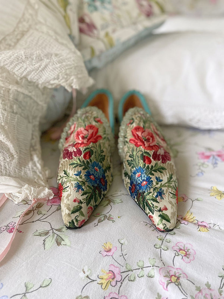 Vita embroidered floral silk brocade bohemian shoes created from antique textiles by PavilionParade. Cottage garden flowers poppies and cornflowers in reds pinks and blues on a pale sage bone ground. 