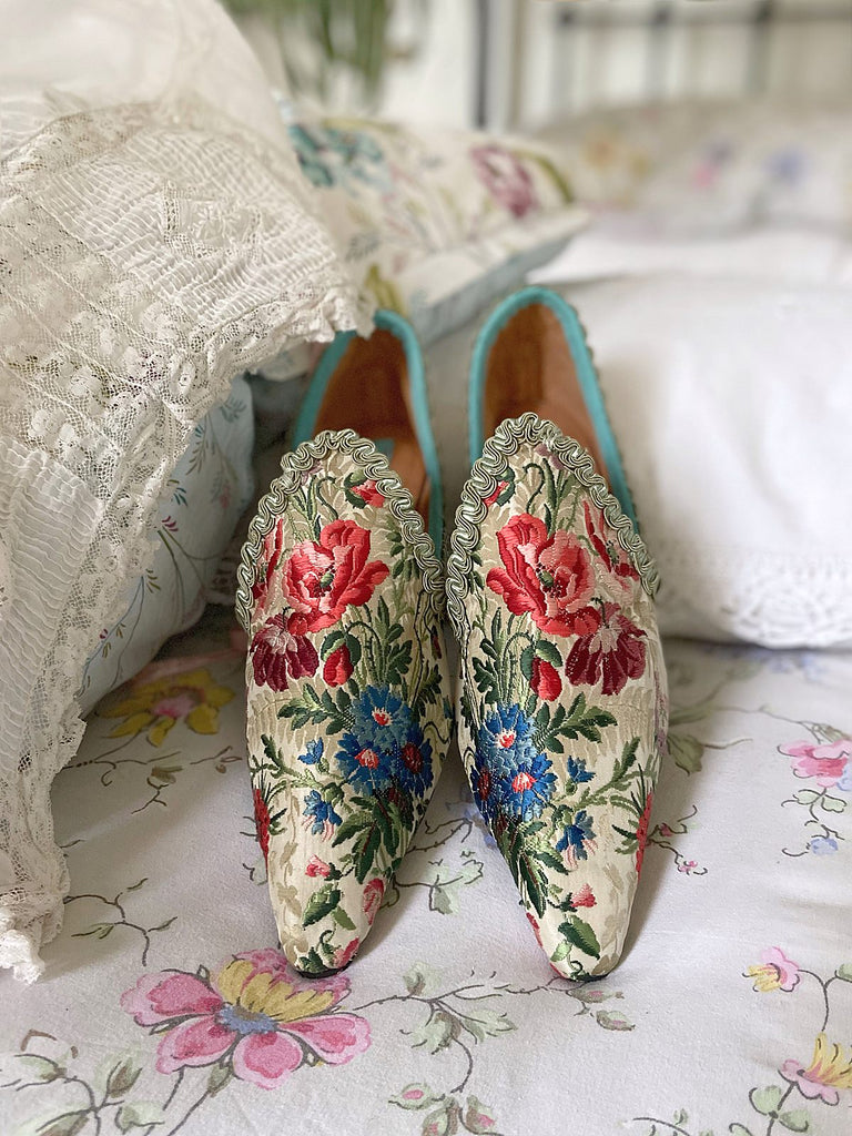 Vita embroidered floral silk brocade bohemian shoes created from antique textiles by PavilionParade. Cottage garden flowers poppies and cornflowers in reds pinks and blues on a pale sage bone ground. 