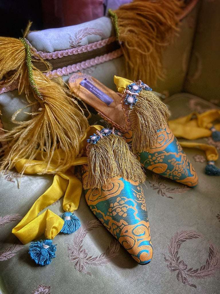 Belle Epoque antique silk in the Japanese style is used to create pointed toe bohemian shoes with tassels and silk ankle ties. Teal blue and gold palette.