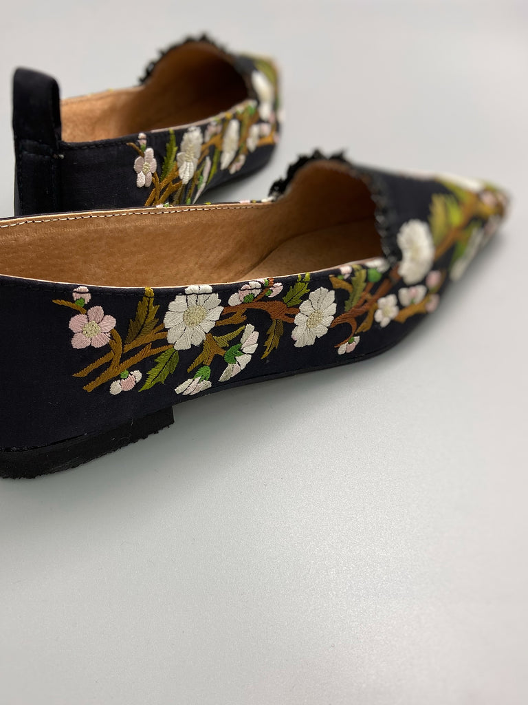 Embroidered daisy black silk satin pointed toe Regency dancing slippers. Bohemian shoes created from antique textiles by Pavilion Parade