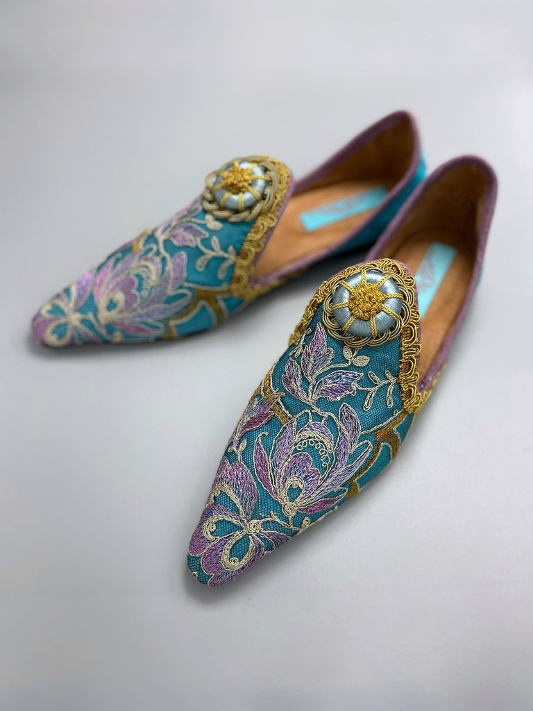 Pointed toe shoes created from antique lilac and gold lace over azure blue silk, with gold braid and vintage Passementerie rosette embellishment. Created by Pavilion Parade.