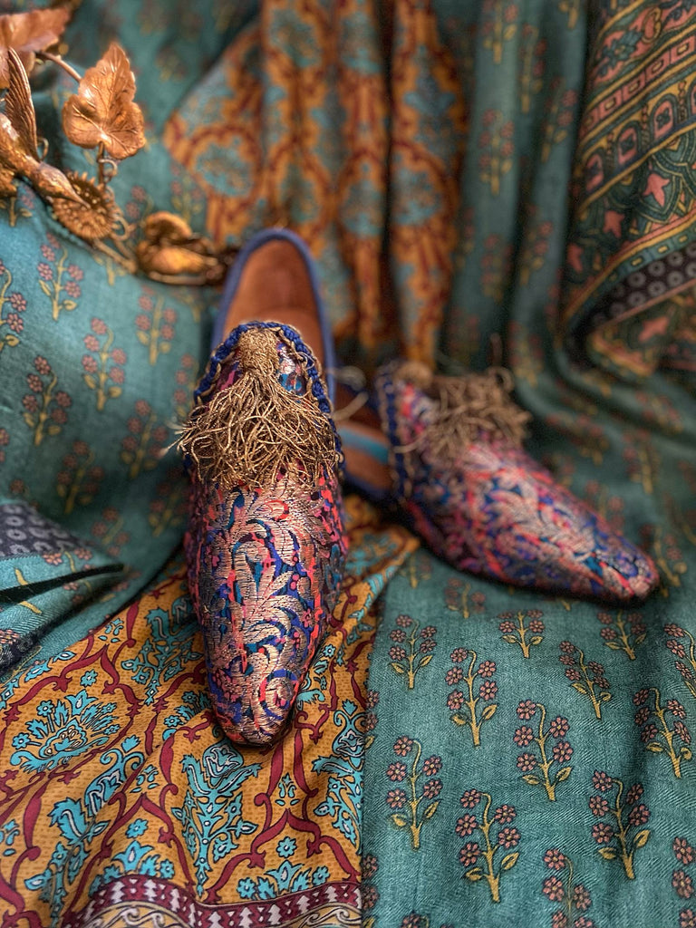 Pointed toe bohemian shoes created from1920s gold silk lamé , with gold ottoman tassels. By Pavilion Parade