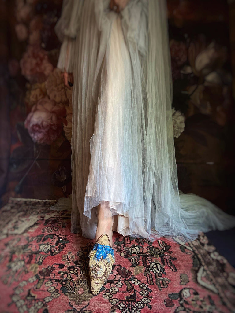 Pavilion Parade handmade shoes created from antique textiles,  available from Joanne Fleming Design. Antique French silk jacquard and 19th century passementerie create bohemian flat shoes in shades of caramel with blue striped silk ribbon bows.