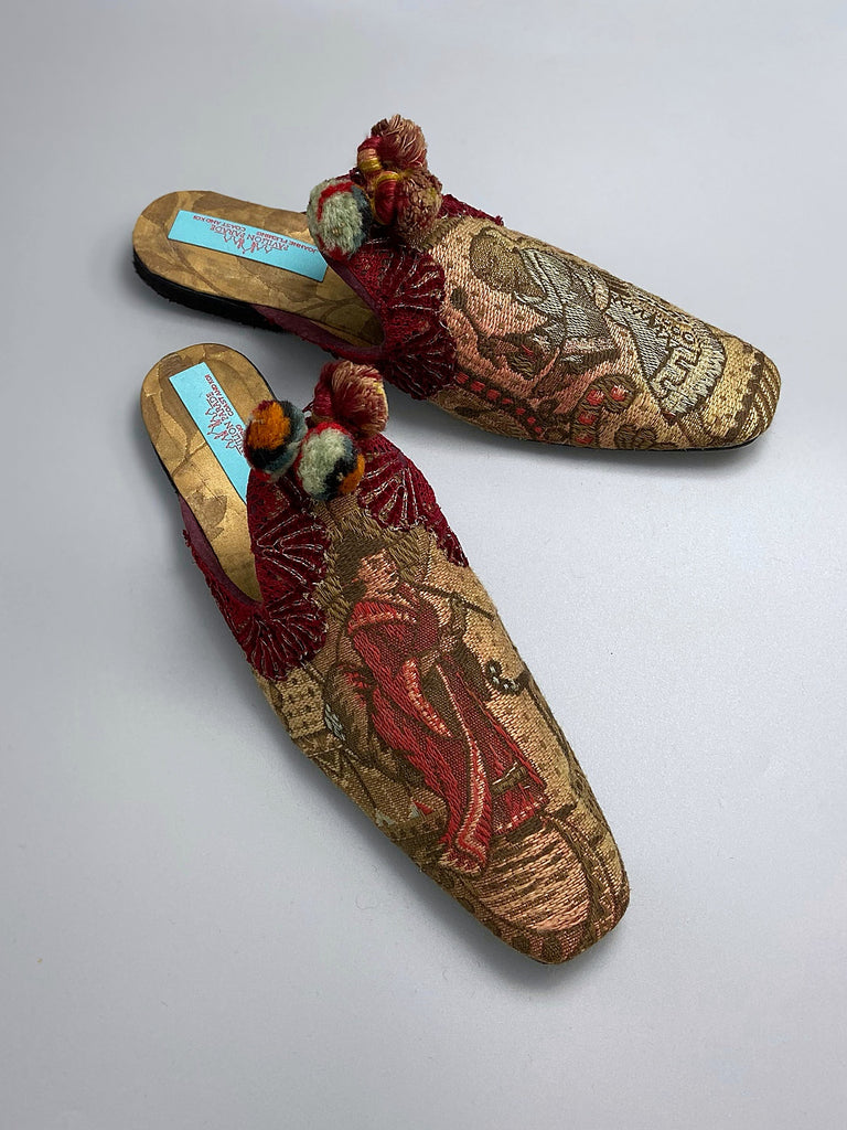 Chinoiserie Japanoiserie slipper shoes created from antique French linen and silk brocade . Embellished with antique pom pom tassels and silk chenille  braid. From the Pavilion Parade studio.