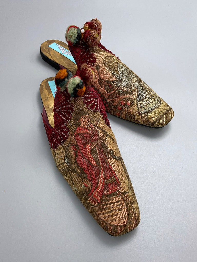 Chinoiserie Japanoiserie slipper shoes created from antique French linen and silk brocade . Embellished with antique pom pom tassels and silk chenille  braid. From the Pavilion Parade studio.