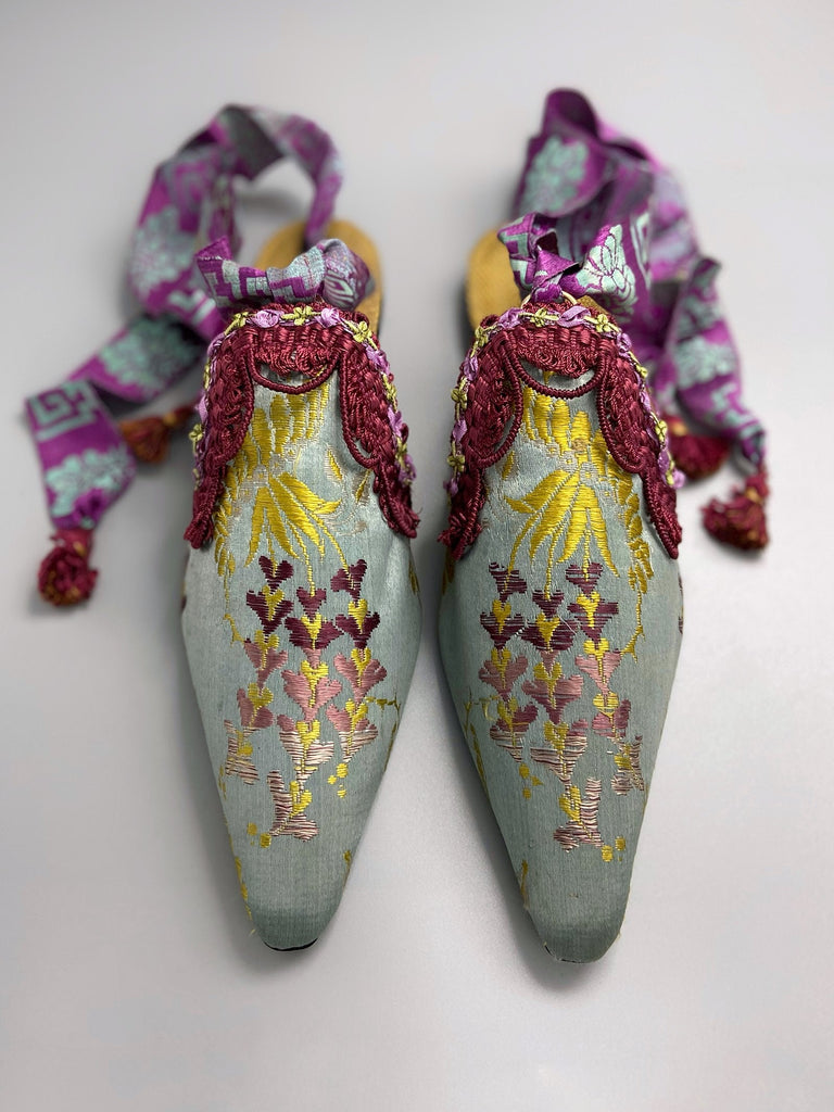Rococo Dicentra silk boho shoes created from antique textiles by Pavilion Parade. French grey embroidered silk with burgundy, chartreuse and mauve details. Ribbon ankle ties.with burgundy 