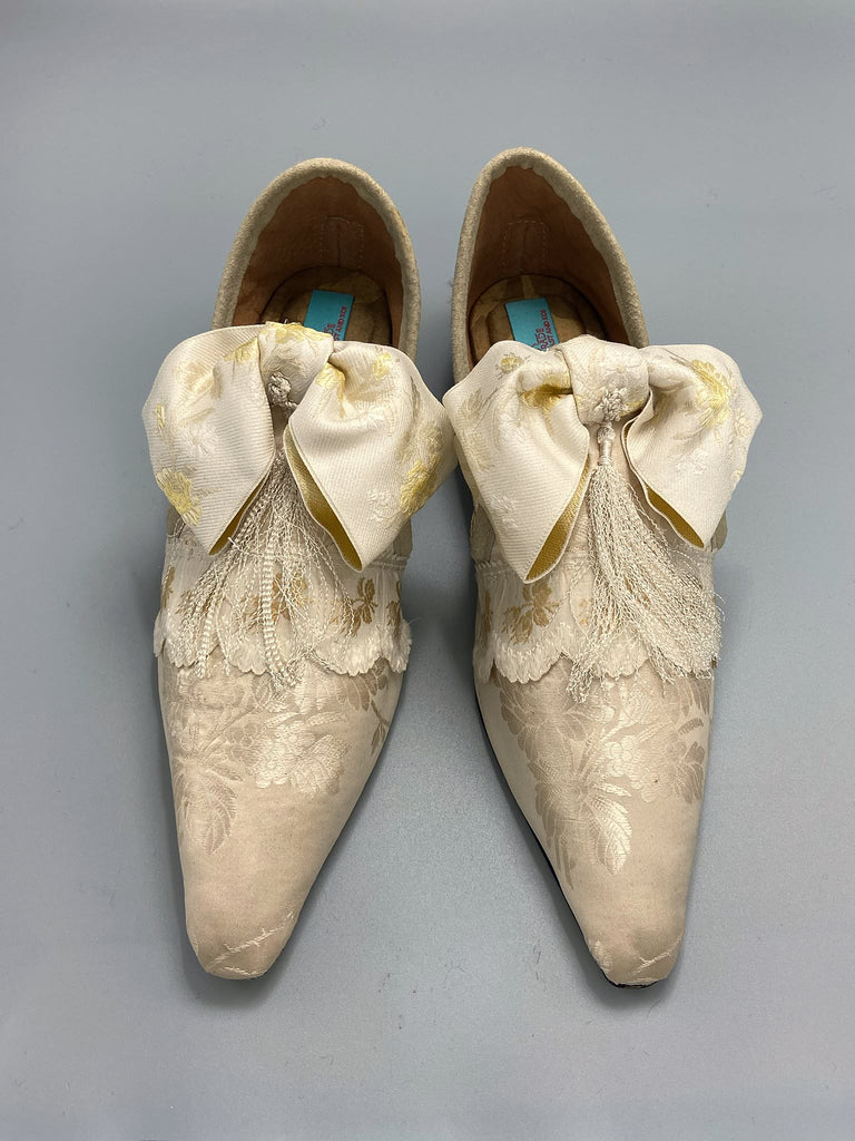 Ivory silk damask bridal boudoir shoes with rococo bows and Victorian tassels. Created from antique textiles by Pavilion Parade