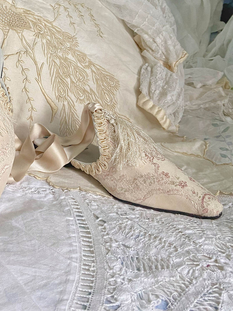 Ivory and pale pink silk brocade bridal boudoir shoes with Victorian tassel embellishment created from antique textiles by Pavilion Parade