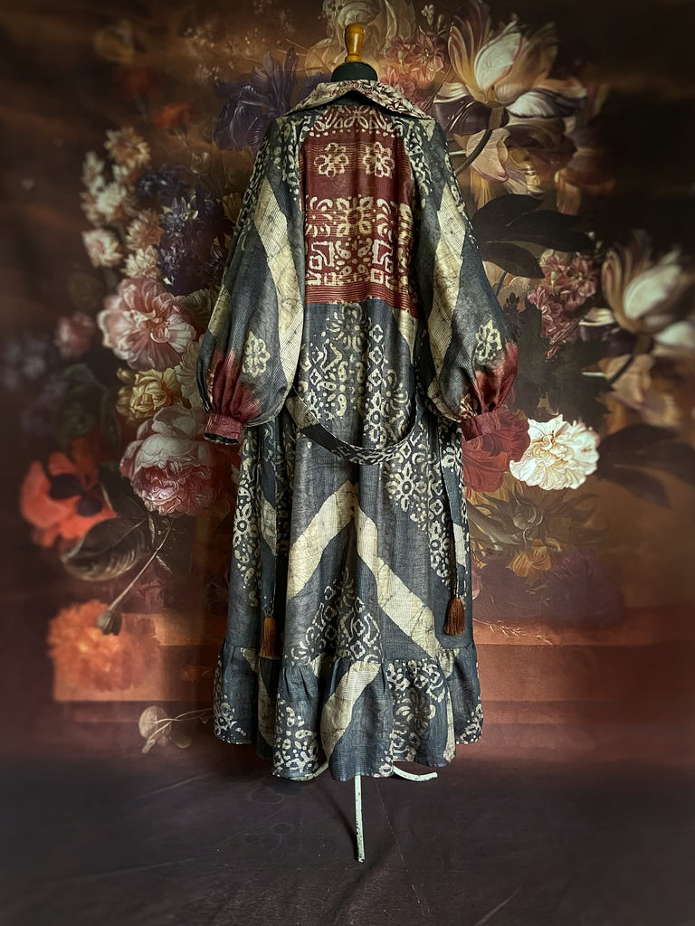 Slate blue and burnt sienna kalamkari and batik cotton reversible robe with very full bishop sleeves. Bohemian style from the Pavilion Parade studio. 