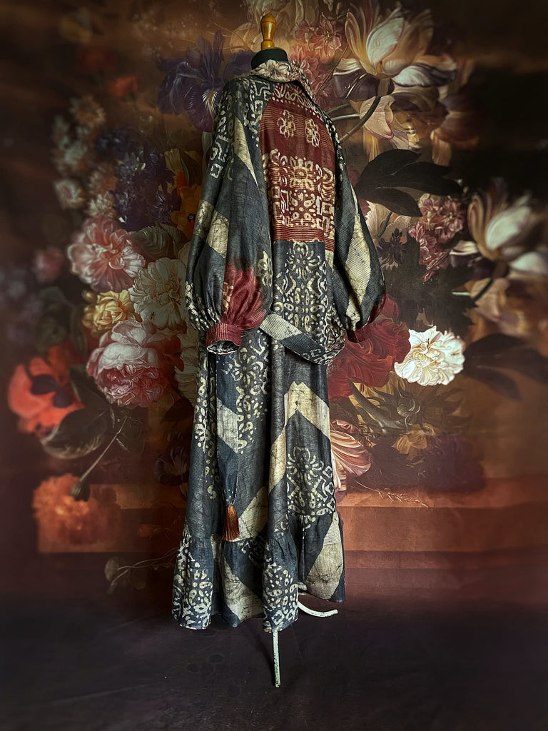 Slate blue and burnt sienna kalamkari and batik cotton reversible robe with very full bishop sleeves. Bohemian style from the Pavilion Parade studio. 